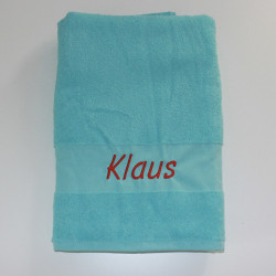 Tyrkisblå håndklæde med navn på