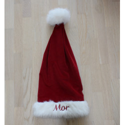 Rød velour nissehue med lang pels og navn